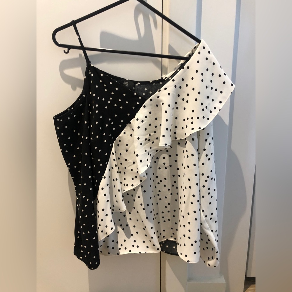 Black and white polka dot one shoulder top with asymmetric pattern. UK 6 (US 2).